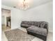 Bright living room with tile floors, modern lighting, and an open layout at 4351 Finch Ln, Kissimmee, FL 34746