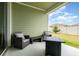Back patio features furniture and a view of the yard at 4351 Finch Ln, Kissimmee, FL 34746