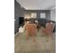 Chic living room with tile floors and cozy seating with a modern aesthetic at 4751 Clock Tower Dr # 103, Kissimmee, FL 34746