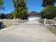 Charming single-story home with a large driveway and fenced yard, offering privacy and curb appeal at 5441 Arpana Dr, Orlando, FL 32839