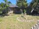 Lush front yard with mature trees and landscaping, enhancing the home's curb appeal at 5441 Arpana Dr, Orlando, FL 32839