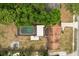 Overhead view of home showing screened pool, detached garage, backyard space, and patio area at 5606 Eggleston Ave, Orlando, FL 32810