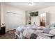 Comfortable bedroom with a large closet and an attached bathroom entrance at 5606 Eggleston Ave, Orlando, FL 32810