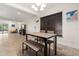 Open dining room with a table, lots of light and direct access to an outdoor living area at 5606 Eggleston Ave, Orlando, FL 32810