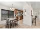 Bright kitchen with wooden cabinets, granite countertops, stainless steel appliances and eat in dining space at 5606 Eggleston Ave, Orlando, FL 32810