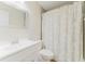 This bathroom features modern fixtures, a toilet, a vanity, and a shower at 604 Chestnut Oak Cir # 106, Altamonte Springs, FL 32701