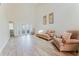 Spacious living room with high ceilings, French doors and ample seating at 604 Chestnut Oak Cir # 106, Altamonte Springs, FL 32701