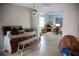 Bright and spacious living room with wood floors and an open floor plan leading to other rooms at 704 Beverly Ave, Altamonte Springs, FL 32701