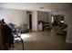 Spacious living room with wood-look flooring and ample natural light, ready for your personal touch at 704 Beverly Ave, Altamonte Springs, FL 32701