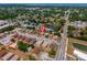 Aerial view showcases the neighborhood and community near the home with mature landscaping at 707 Michigan Ct # 2, St Cloud, FL 34769