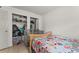 Comfortable bedroom featuring a comfy bed, functional closet, and neutral paint at 707 Michigan Ct # 2, St Cloud, FL 34769