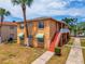 Charming two-story home with updated paint, stairs, and mature landscaping at 707 Michigan Ct # 2, St Cloud, FL 34769