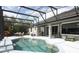 Screened-in patio includes a pool, seating, and is attached to a home with neutral siding at 753 Grey Heron Pl, Chuluota, FL 32766