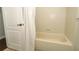 Bathroom featuring a bathtub behind a shower curtain at 753 Grey Heron Pl, Chuluota, FL 32766
