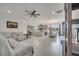 An open-concept living space that combines living, kitchen and dining for entertaining at 7651 Five Oaks Dr, Harmony, FL 34773