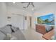 This bright and spacious home office offers ample storage, comfortable seating, and plenty of natural light at 7651 Five Oaks Dr, Harmony, FL 34773