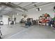 Spacious garage with ample storage and plenty of room for a workshop and parking at 841 Oaks Shores Rd, Leesburg, FL 34748