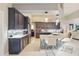 This kitchen features navy cabinets, white countertops, stainless steel appliances, and a tiled backsplash at 841 Oaks Shores Rd, Leesburg, FL 34748