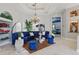 Sophisticated living room with high ceilings, elegant seating, and stylish decorative accents at 841 Oaks Shores Rd, Leesburg, FL 34748