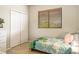 A bedroom featuring a window, closet, and playful bedding, creating a cozy and imaginative space at 9020 Breezy Meadow Way, Orlando, FL 32829