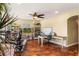 Spacious office with tile flooring, a ceiling fan, and multiple desks at 9020 Breezy Meadow Way, Orlando, FL 32829