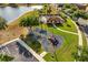 Community park featuring a playground, pool and a scenic lake at 9020 Breezy Meadow Way, Orlando, FL 32829