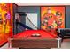 Game room featuring a pool table, foosball table and custom wall decor at 9332 Sommerset Hills Dr, Davenport, FL 33896