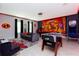 Spacious game room with foosball table, billiard table, and fun decor at 9332 Sommerset Hills Dr, Davenport, FL 33896