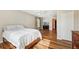 Bright bedroom with hardwood floors, large window, and closet at 10404 Park Commons Dr, Orlando, FL 32832
