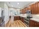 Bright, open kitchen with stainless steel appliances and ample counter space at 10404 Park Commons Dr, Orlando, FL 32832