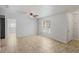 Open-concept living space featuring tile floors and a view to the front yard at 1051 Arden St, Longwood, FL 32750
