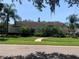 Charming home with lush landscaping, mature trees, and a well-manicured lawn at 1121 Arbor Glen Cir, Winter Springs, FL 32708