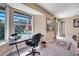 Bright office space with pool views, a desk, and a decorative area rug at 1121 Arbor Glen Cir, Winter Springs, FL 32708