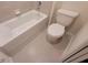 Clean bathroom with a bathtub, toilet, and tiled flooring at 1264 Blue Island Dr, Clermont, FL 34714