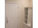 Entryway featuring a white door with shelves at 1286 Shoreside St, Clermont, FL 34714