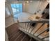 Open-concept living room featuring modern tile flooring, island, and natural light at 1286 Shoreside St, Clermont, FL 34714