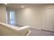 A bright and spacious loft area with neutral carpet at 1286 Shoreside St, Clermont, FL 34714