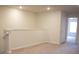 A bright and spacious loft area with neutral carpet and recessed lights at 1286 Shoreside St, Clermont, FL 34714