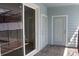 An outdoor patio area with sliding glass doors and pool view at 1286 Shoreside St, Clermont, FL 34714