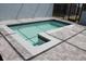 Inviting in-ground pool showcases integrated steps and a paved deck, perfect for relaxation at 1286 Shoreside St, Clermont, FL 34714