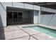 Outdoor patio featuring a swimming pool with enclosure and nearby sliding glass door at 1286 Shoreside St, Clermont, FL 34714