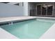 The backyard pool offers a serene retreat with its modern design and meticulous tile work at 1286 Shoreside St, Clermont, FL 34714