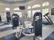 Well-equipped fitness center featuring modern exercise machines and ample space for a comprehensive workout routine at 14001 Fairway Island Dr # 513, Orlando, FL 32837