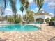 Beautiful community pool and outdoor lounge area with sun chairs, perfect for relaxing and enjoying the Florida sunshine at 14001 Fairway Island Dr # 513, Orlando, FL 32837