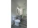 This bathroom features a gray vanity, modern fixtures, and great lighting at 1412 Pine St, Orlando, FL 32824