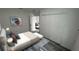 Bright bedroom featuring closet with bi-fold doors and stylish gray vinyl plank flooring at 1412 Pine St, Orlando, FL 32824