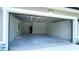 Spacious two car garage with access door to the home at 1412 Pine St, Orlando, FL 32824