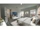 Bright main bedroom with ensuite bathroom and modern furnishings at 1412 Pine St, Orlando, FL 32824