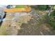 Backyard fire pit with tree stumps, a perfect cozy spot for outdoor relaxation and entertainment at 14120 Rutgers Ave, Orlando, FL 32826