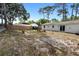 Large, unfurnished backyard with new grass potential at 14120 Rutgers Ave, Orlando, FL 32826